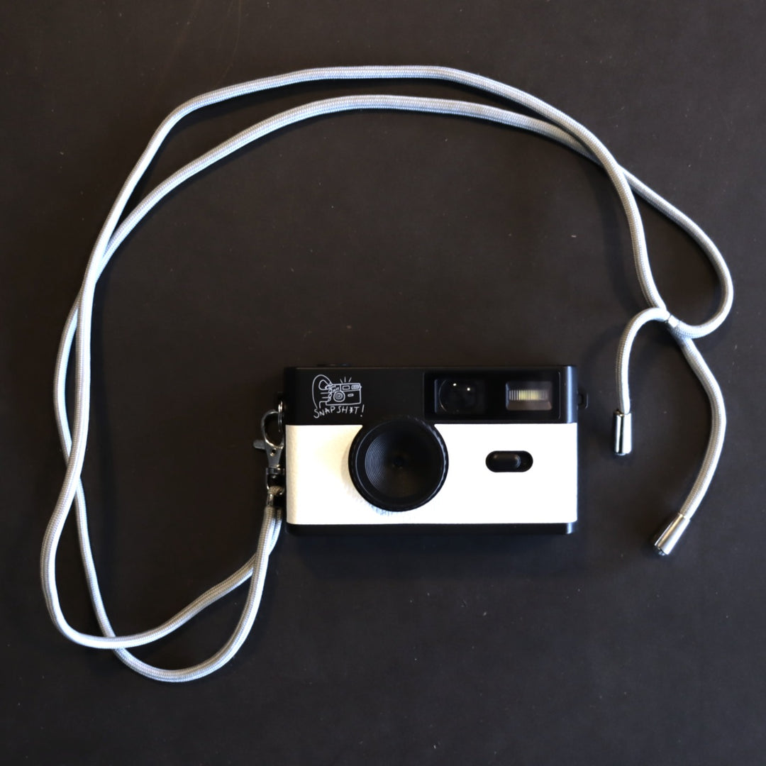 SNPSHT over the shoulder camera strap in teal