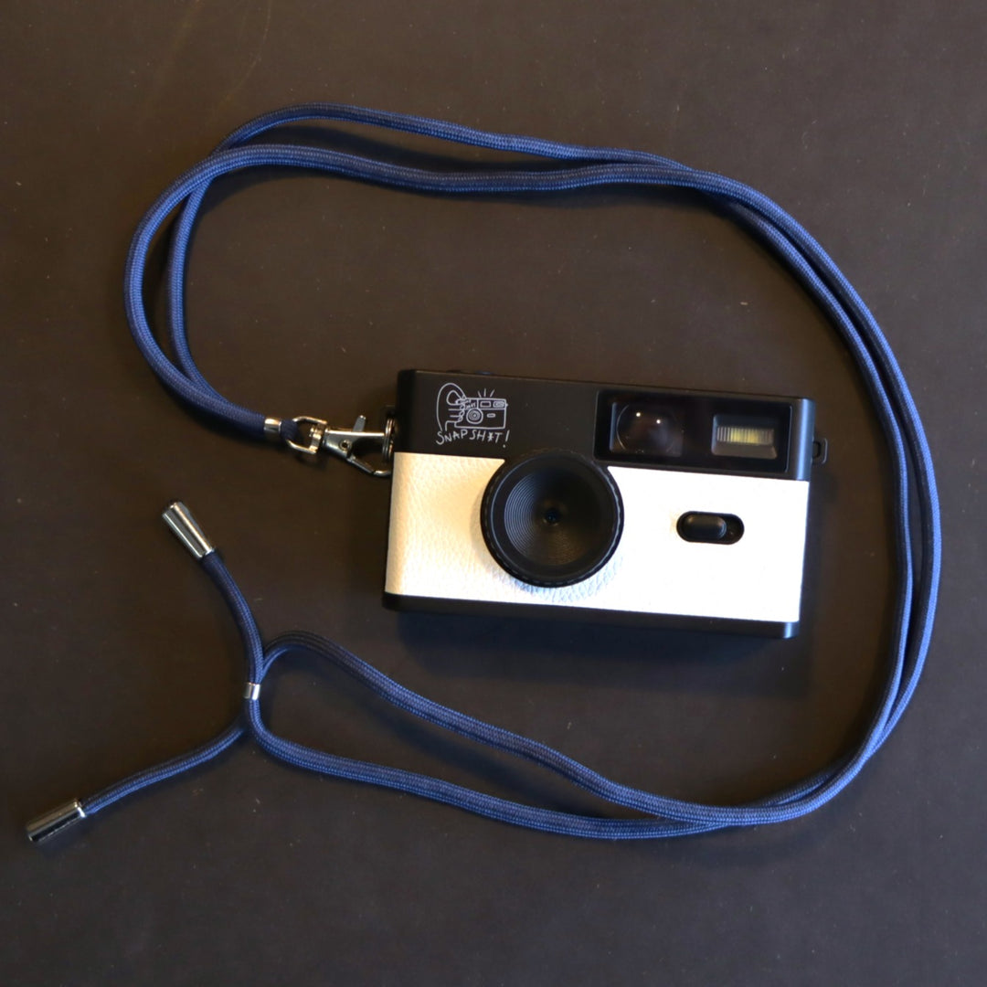SNPSHT over the shoulder camera strap in pink