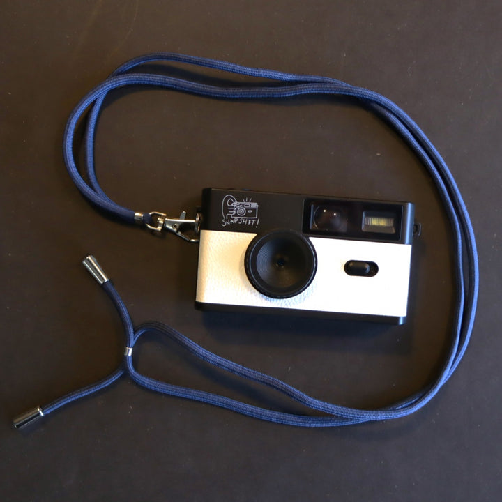SNPSHT over the shoulder camera strap in pink