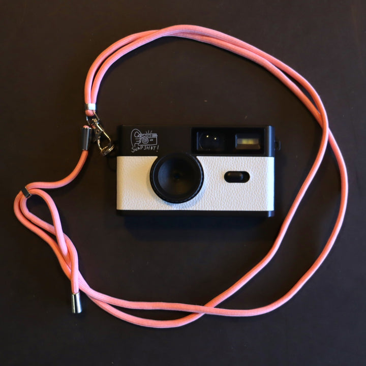 SNPSHT over the shoulder camera strap in black